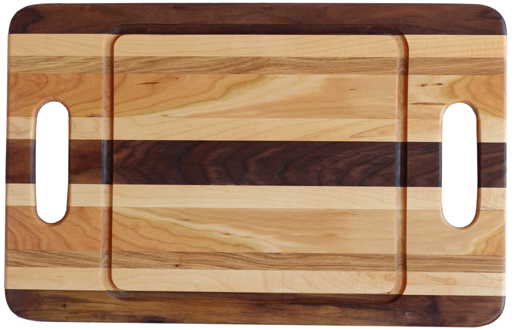 http://www.shenandoahhomesteadsupply.com/cdn/shop/products/double-handle-cutting-boards-including-oil-126187_1024x1024.jpg?v=1697819147